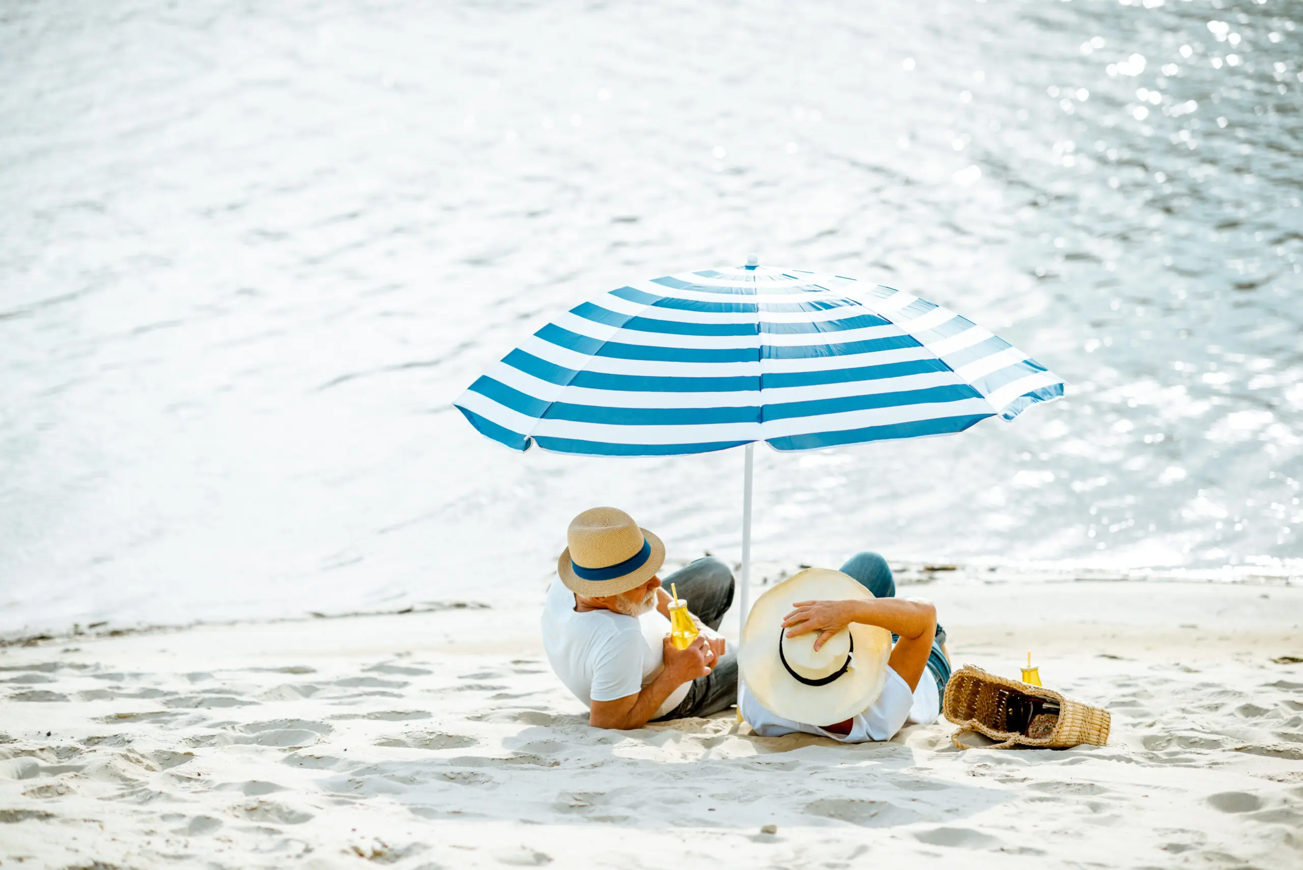Senior couple on the beach life insurance
