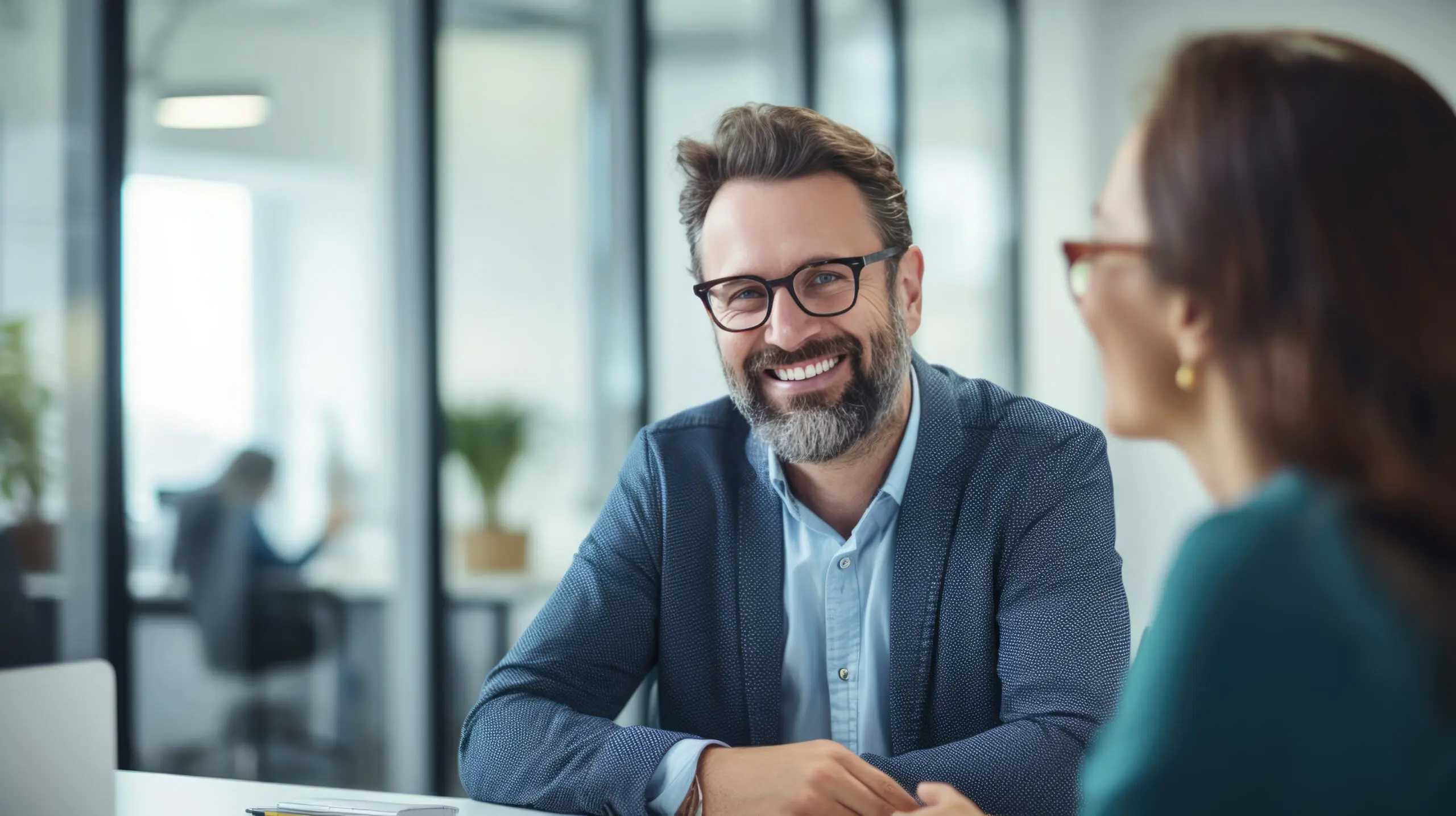 Portrait of successful business people discuss business issues in the office during meeting