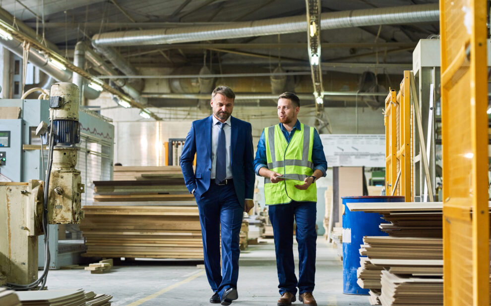 Mature Businessman Inspecting Modern Factory Loss of a Key Person