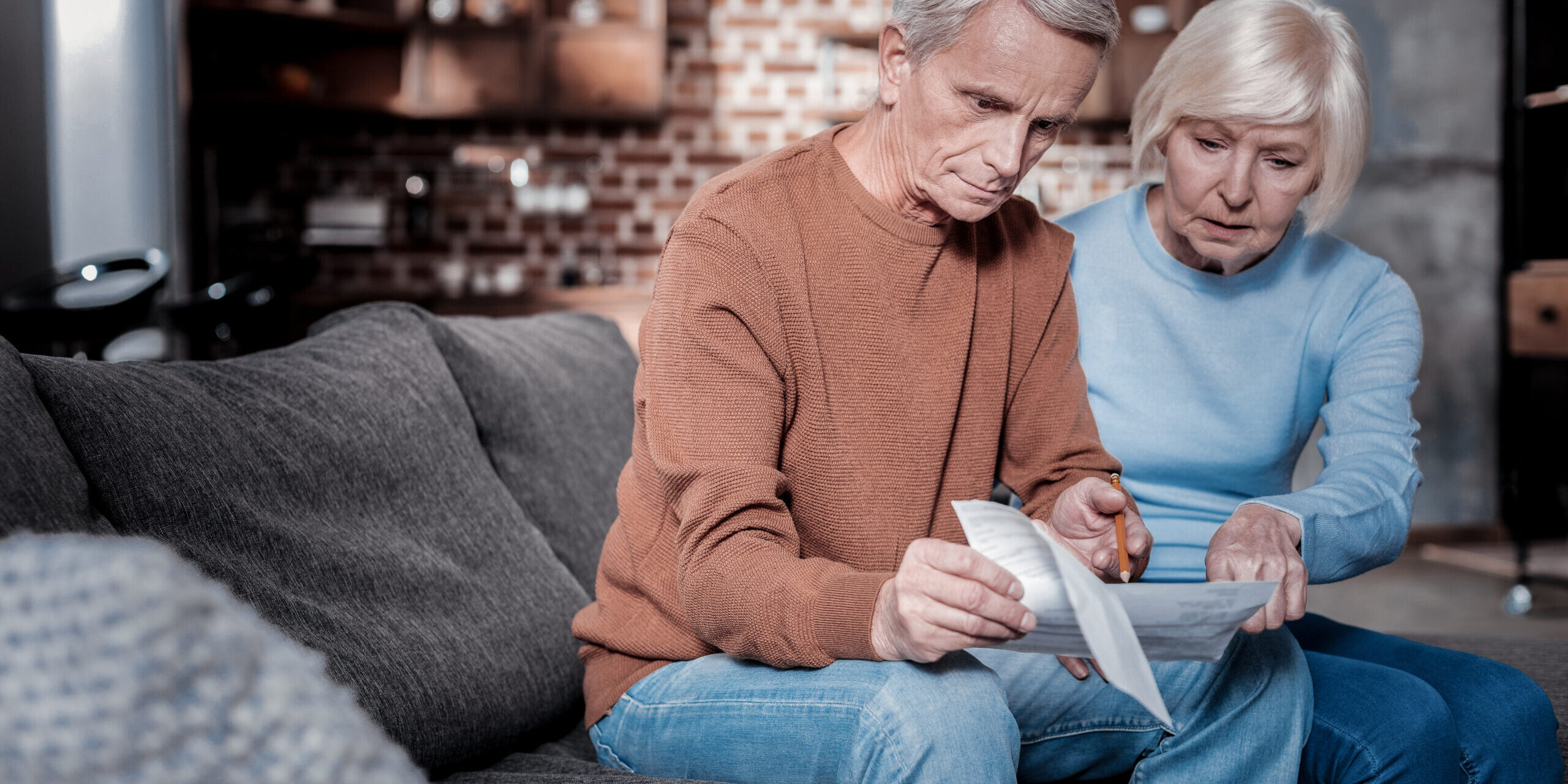 Serious man looking at savings