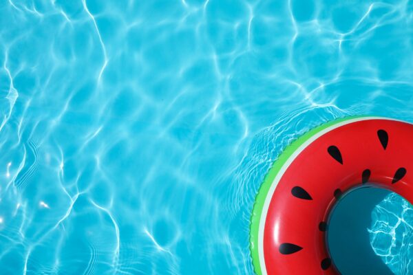 Inflatable ring floating in swimming pool on sunny day, top view Surprising Tax Deductions