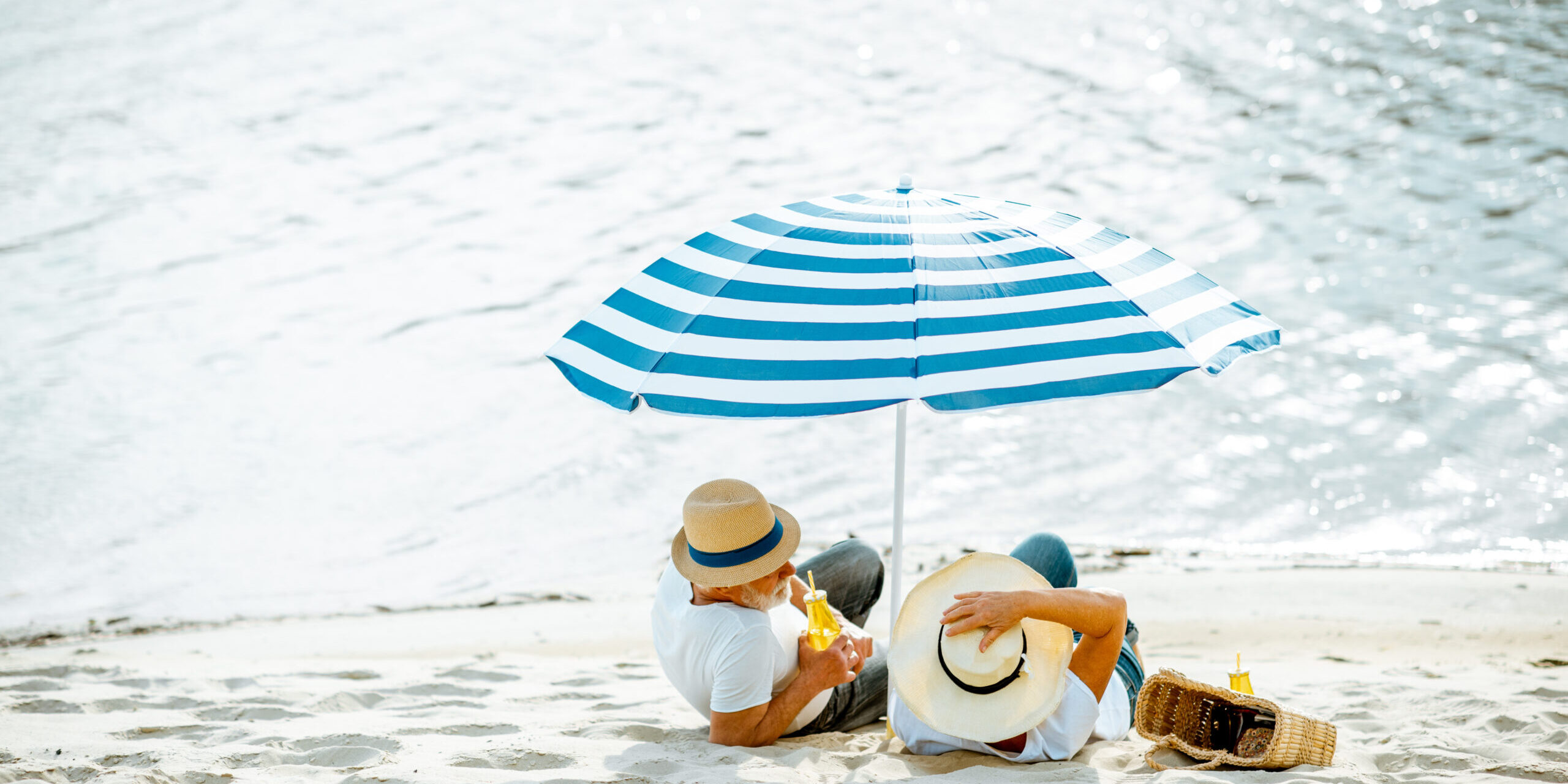 Senior couple on the beach life insurance