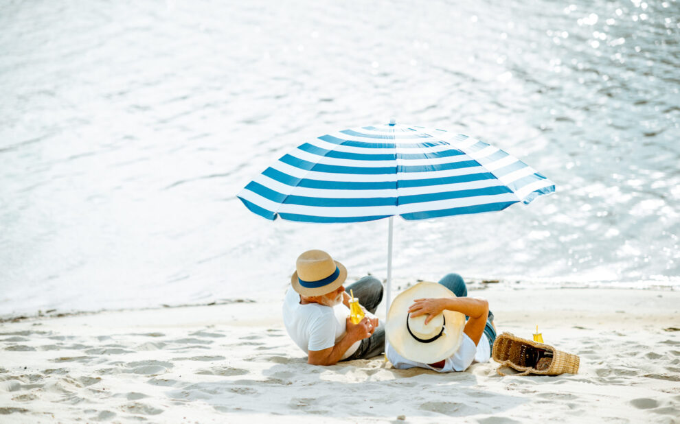 Senior couple on the beach life insurance