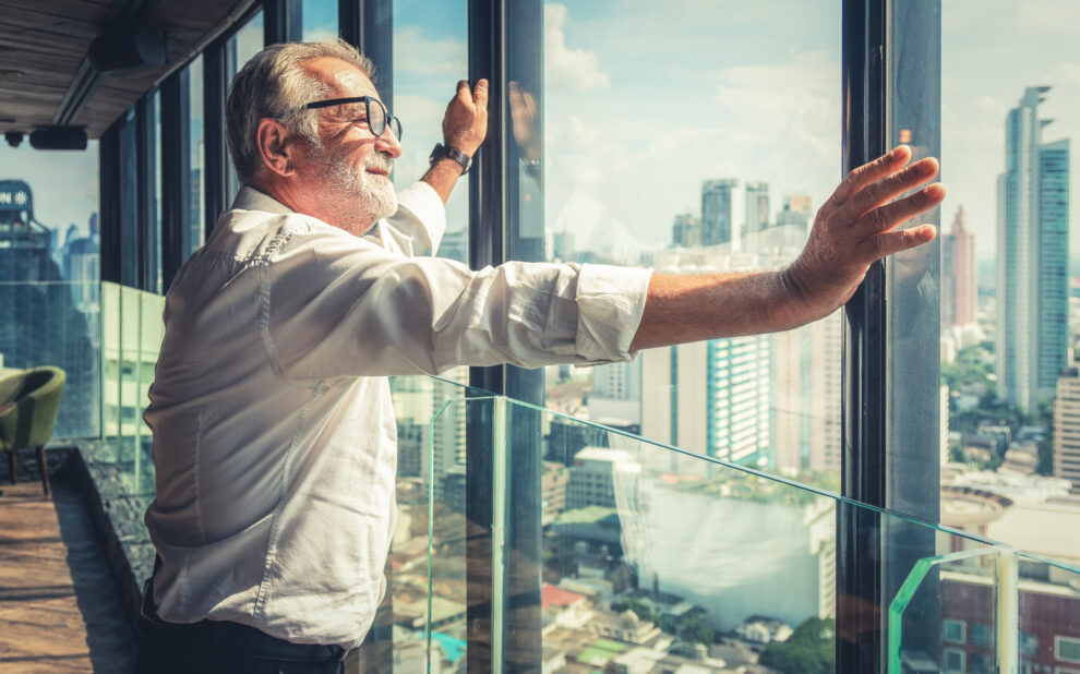portrait of senior businessman with beard and glasses feeling co Retirement Accounts for Business Owners