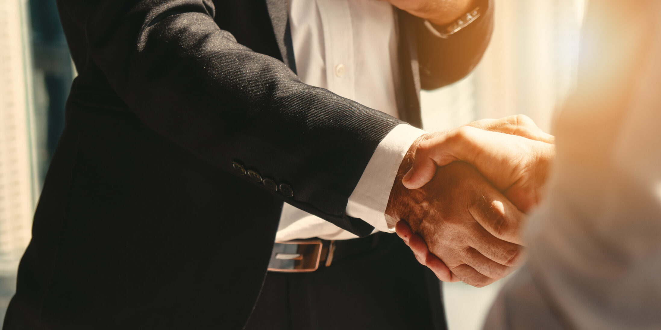 business background of businessman having handshake