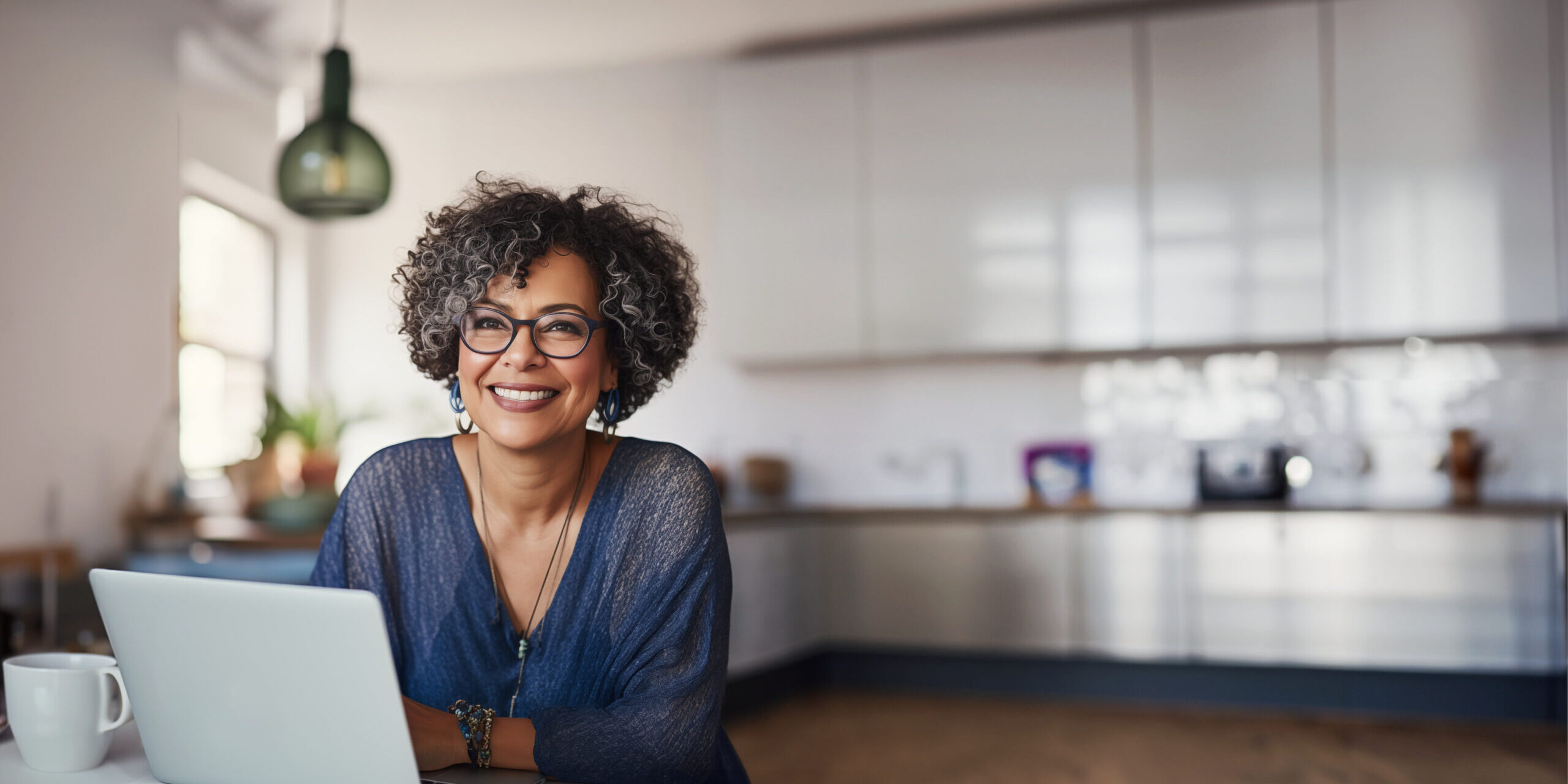 Middle Aged Woman Working from Home in her modern Kitchen women and retirement