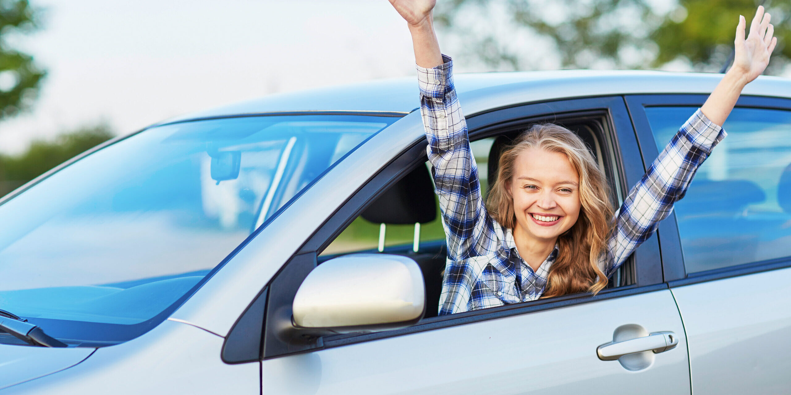 woman looking out of the car window Teen Driver