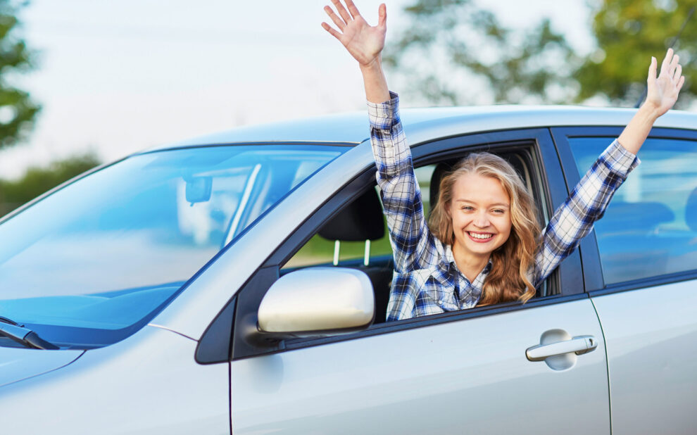 woman looking out of the car window Teen Driver